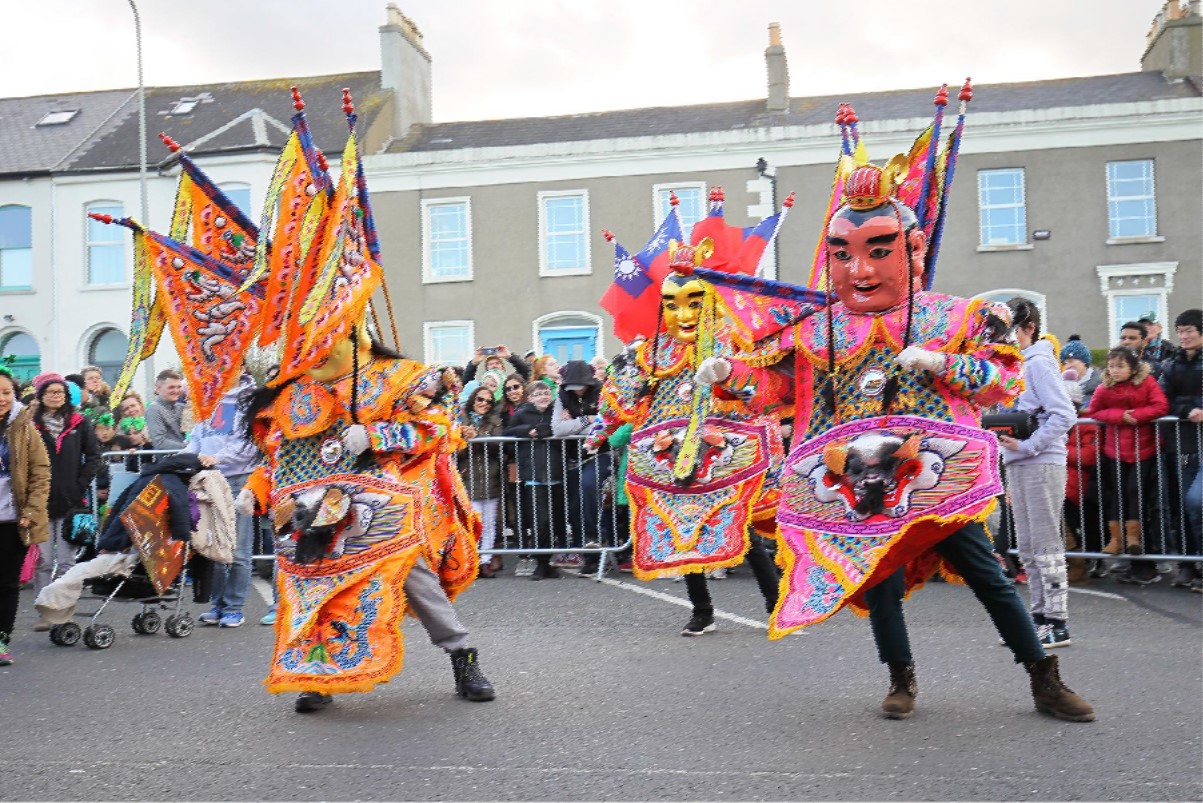 Chinese actors dancing at the St Patrick's Day Parade in Bray 2019