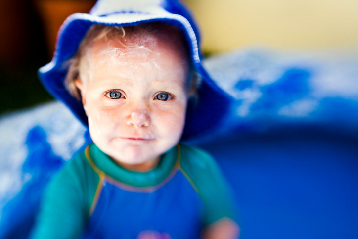 Child with Sun Screen