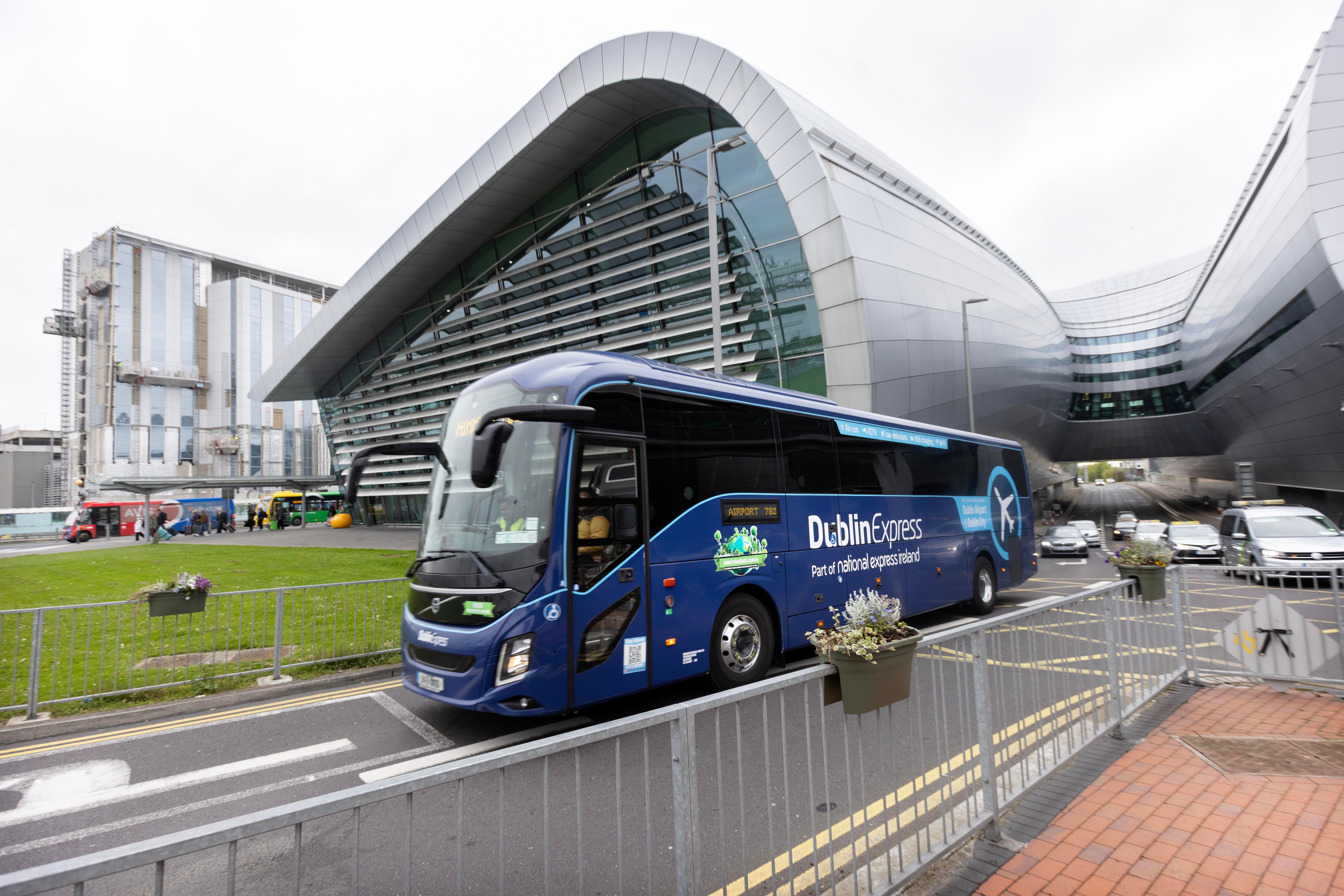 Dublin Express bus going past the Terminal 2 building at Dublin Airport